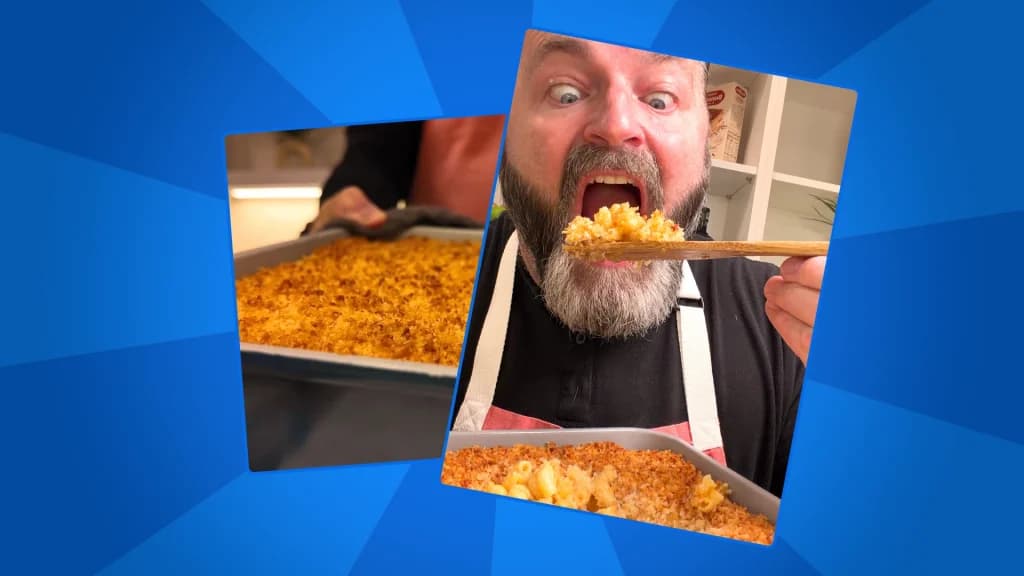 Eric James dives in to eat his mac and cheese with a wooden spoon