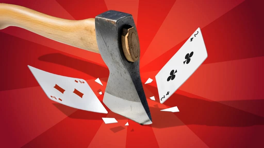 An axe slices through a red and black two on a red background.