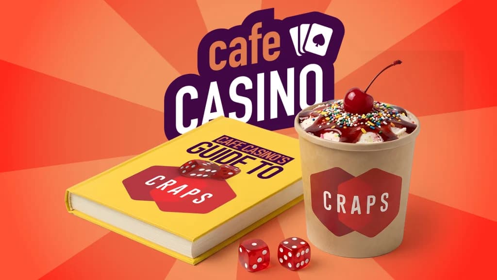 The Cafe Casino logo is displayed behind a yellow craps guide and a cherry sundae in a paper cup.