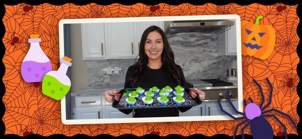 Chef Gen carries a tray of deviled eggs on an orange background with spiderwebs