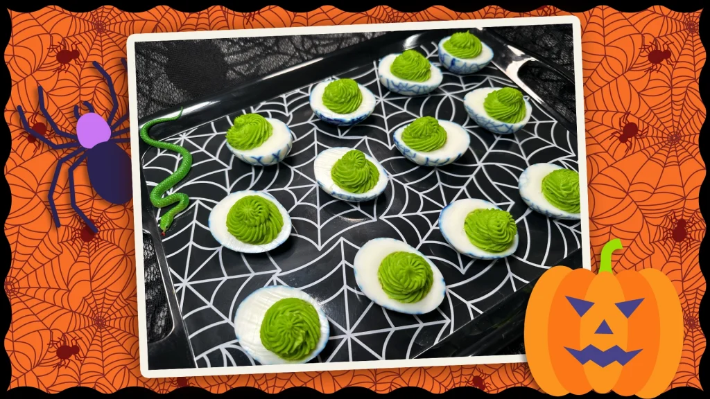 The green yolk mixture is piped back on to the yolks, giving a halloween look to the eggs