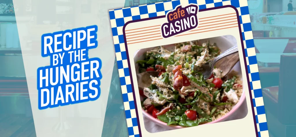 A green salad mixed in a large bowl, with chicken salad, cherry tomatoes, bacon pieces and quinoa, is visible on an old-school-style Cafe Casino menu.